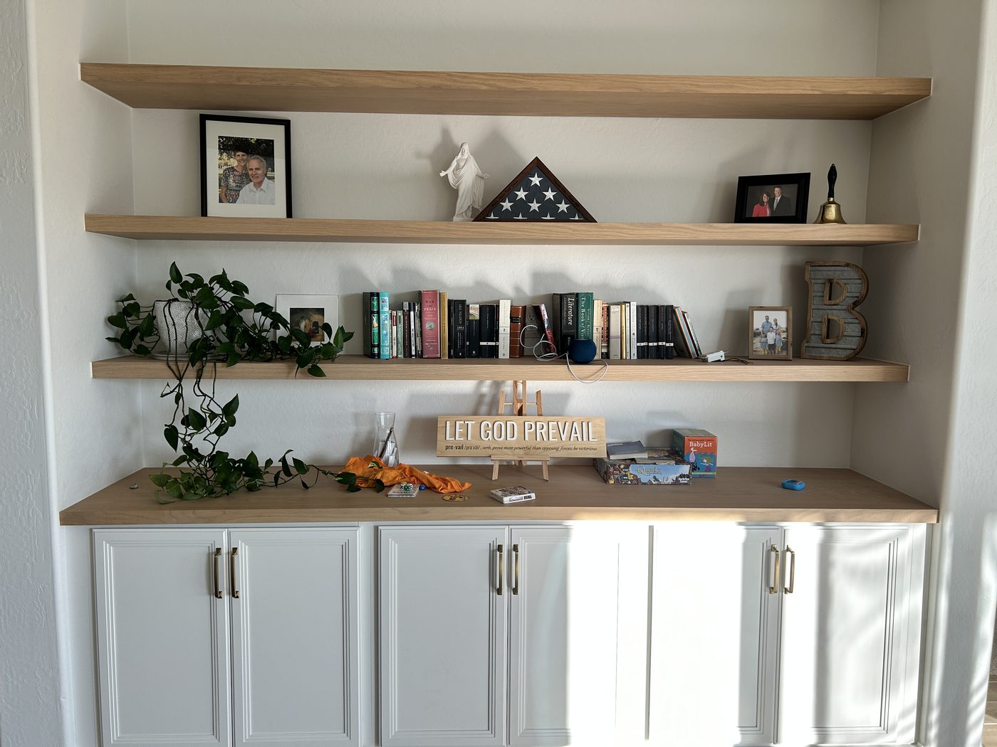 Built-In Shelving — White oak floating shelves over cabinet base