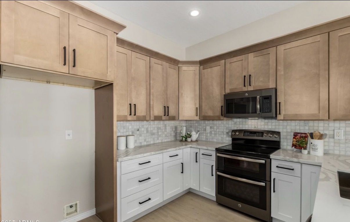 Two-tone kitchen custom corner cabinetry