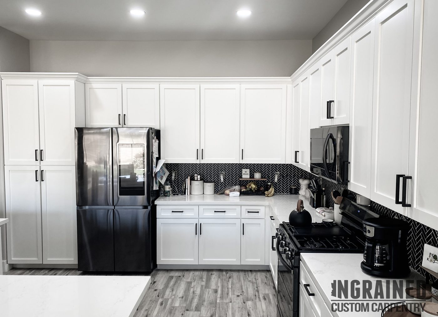 Custom Kitchen — White shaker · herringbone backsplash