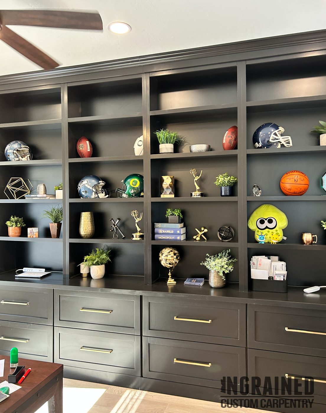 Office Built-Ins — Floor-to-ceiling charcoal shelving